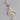 Small celestial suncatcher with brass moon and sun shapes and iridescent glass crystals